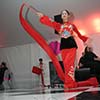 Stylized exotic performer providing entertainment at high end NYC event with ribbon performance