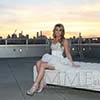 Portrait from elegant luxury sweet 16 with NYC skyline captured at sunset