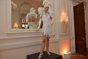 Great Gatsby themed performer at sweet 16 in white dress