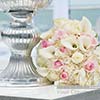 Close up of white and pink centerpiece and bouquet from elegant NYC wedding